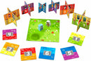 Rhino Hero Junior game by HABA featuring colorful folding cards, two playful characters, and numbered challenge tiles set on a vibrant green game board with flowers. Ideal for young players to develop skills in balance and strategy.