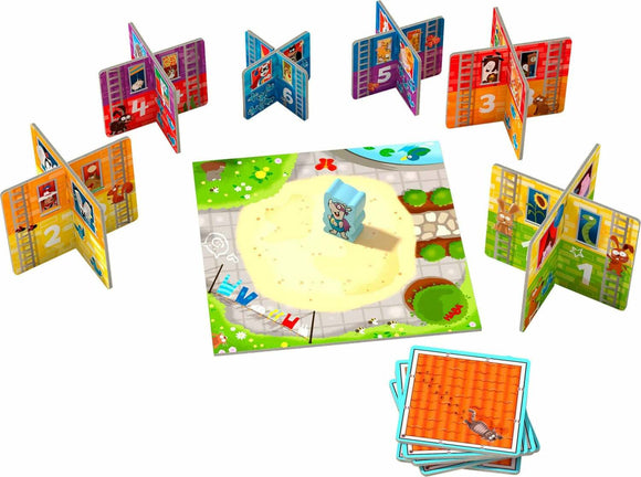 The Rhino Hero Junior game set features vibrant cardboard cards arranged in a playful layout around a colorful game board. The central character is a blue rhino standing on a sandy area, surrounded by other colorful cards depicting various characters. This appealing and engaging game promotes skills such as stacking, balance, and social interaction for young children.