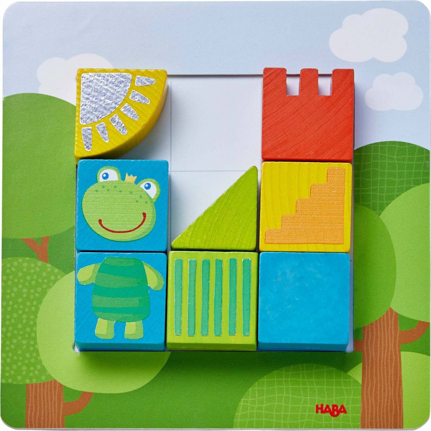 A vibrant mechanical puzzle featuring colorful animal-shaped blocks. The puzzle grid includes a frog block, triangular shapes, and a castle piece, set against a playful green background with trees and clouds.