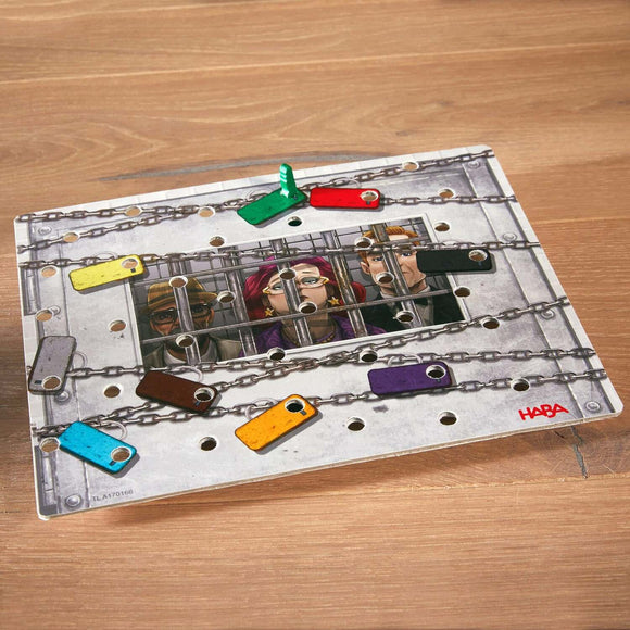 The Key Royal Star Casino game by Haba, featuring colorful keys on a board with a vibrant illustration of characters behind bars, promoting strategic gameplay and teamwork.