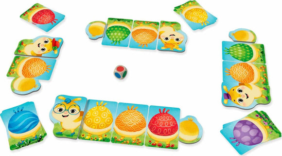 The Rainbow Caterpillar game by HABA features colorful, playful pieces with cute animal characters and vibrant designs. The pieces are arranged around a central dice, inviting players to engage in creative gameplay that encourages social interaction and imaginative storytelling.