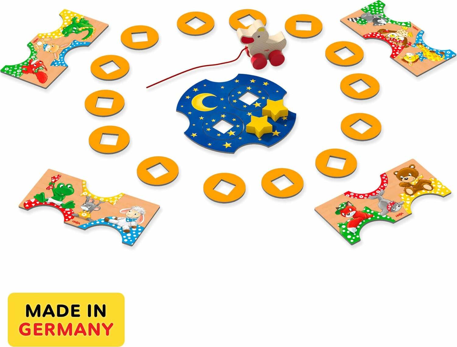 The Duck Game by HABA features a colorful children's game set on a round base with various illustrated puzzle pieces and a wooden duck. The game involves engaging characters such as animals in playful designs, with bright colors that appeal to kids. The circular layout allows players to interact as they fit the pieces together, enhancing motor skills and social play. The game is proudly made in Germany, ensuring high-quality craftsmanship.