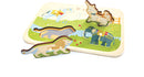  Wooden river and meadow landscape with a horse, unicorn, lion, and elephant puzzle piece with wooden dowel knobs. The elephant and horse pieces are in their spots and the unicorn and lion are upright to show empty spaces