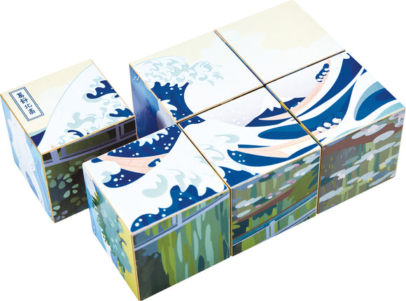 wooden cubes assembled 2x3 to depict Hokusai's The Wave in a simplified, illustrated style