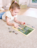 Child assembling jigsaw puzzle