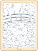 black and white line art puzzle of bridge over water lily covered pond in wooden frame
