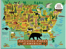 A colorful 1000-piece jigsaw puzzle depicting a map of the National Parks of America, featuring various animals and notable parks such as Yellowstone, Yosemite, and Grand Canyon. The illustration includes forests, mountains, and bodies of water, showcasing the diverse American landscape.