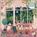 A colorful jigsaw puzzle titled 'Florette' featuring a charming scene of a pet-friendly flower shop. The illustration includes an array of potted plants, vibrant flowers, a white dog wearing a floral collar, and a striped cat, all set against a backdrop with large windows. The puzzle consists of 500 pieces, ideal for both adults and older children, encouraging creativity and relaxation.