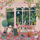 A colorful jigsaw puzzle featuring a charming indoor garden scene. The design includes vibrant flowers in pots, lush greenery, and playful cats, set against a pink window backdrop. A decorative chalkboard adds personalization to the cozy atmosphere.