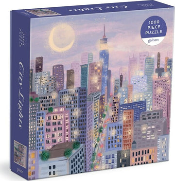 Galison City Lights 1000-piece jigsaw puzzle featuring a beautifully illustrated urban skyline at dusk, with colorful buildings and a soft glow from the city lights and moon.