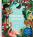 The Wild Tropics Surprise Puzzle by Galison features a vibrant illustration of exotic flora and fauna, including a tiger, flamingo, and butterflies. This 1000-piece jigsaw puzzle promises rich visual delight as scenes come together during assembly.