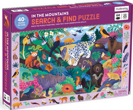 The In the Mountains Search & Find Puzzle by Mudpuppy features a vibrant and colorful illustration of mountain scenery filled with various animals, plants, and hidden objects to find. It includes 64 puzzle pieces and encourages observation skills while piecing the puzzle together.