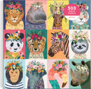 Colorful 500-piece jigsaw puzzle titled 'Wild Spirit' by Galison, featuring adorable animal illustrations with floral crowns. Animals depicted include a lion, hippo, giraffe, tiger, panda, lion cub, zebra, sloth, monkey, elephant, flamingo, and rhino, all adorned with vibrant flowers against bright background colors.