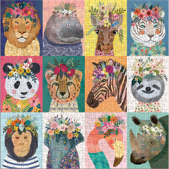 A colorful jigsaw puzzle titled 'Wild Spirit' featuring whimsical illustrations of various animals, each adorned with floral crowns. The animals include a lion, hippopotamus, giraffe, tiger, panda, lion cub, zebra, sloth, monkey, elephant, flamingo, and rhino, all designed with vibrant colors and patterns.