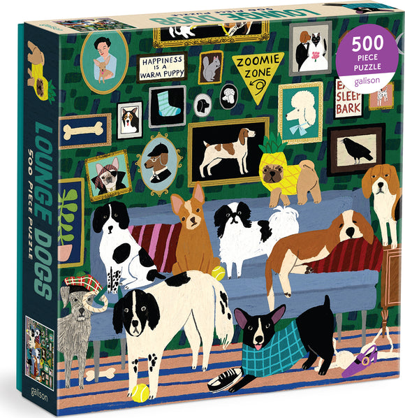 The Lounge Dogs Foil jigsaw puzzle by Galison features an illustration of various dog breeds lounging on a couch, surrounded by framed dog-themed art. The scene is colorful and playful, showcasing a cozy home environment with several playful puppies and dogs, including a corgi, a bulldog, and a beagle. The puzzle contains 500 pieces, making it suitable for both children and adults who enjoy assembling jigsaw puzzles.