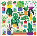 Happy Plants 500-piece jigsaw puzzle featuring various cute and colorful illustrated houseplants with smiling faces in decorative pots, presented by Chronicle Books. The design includes a variety of plant types like cacti, ferns, and leafy greens, all arranged in a vibrant and whimsical fashion, perfect for plant lovers and puzzle enthusiasts alike.
