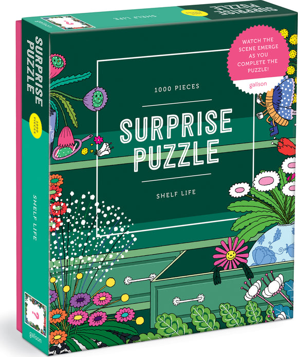 The Shelf Life Surprise Puzzle by Galison features a vibrant design with 1000 pieces showcasing colorful plants and flowers. The puzzle box emphasizes the fun of watching the scene emerge as it is completed.