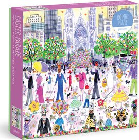 The 'Easter Parade' jigsaw puzzle by Galison showcases a vibrant street celebration with people in joyful attire. The scene includes men and women in stylish outfits, children in playful costumes, and whimsical elements like flowers and Easter bunnies. Tall buildings and lush trees create a springtime backdrop. This 500-piece puzzle offers a delightful challenge for all ages, making it ideal for family gatherings or solo enjoyment.