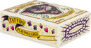 A colorful box of Tattoo Playing Cards by Chronicle Books, featuring a striking design of a black panther with green eyes. The box includes playful elements like dice and decorative symbols in a vibrant mix of colors, perfect for adding a unique flair to game nights.