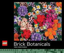 A vibrant collection of LEGO flowers and plants in colorful shades arranged playfully. The puzzle features a variety of floral elements, including red, pink, and purple flowers, surrounded by greenery and decorative features, showcasing the creativity of LEGO Brick Botanicals.