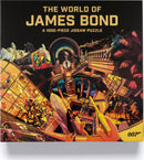 The World of James Bond jigsaw puzzle box featuring a vibrant and intricate illustration showcasing iconic elements of James Bond films including vehicles, characters, and dramatic settings. The box is designed in bold colors with a 007 logo, emphasizing the allure of the spy theme. This is a 1000-piece puzzle that invites fans to piece together the thrilling world of espionage.