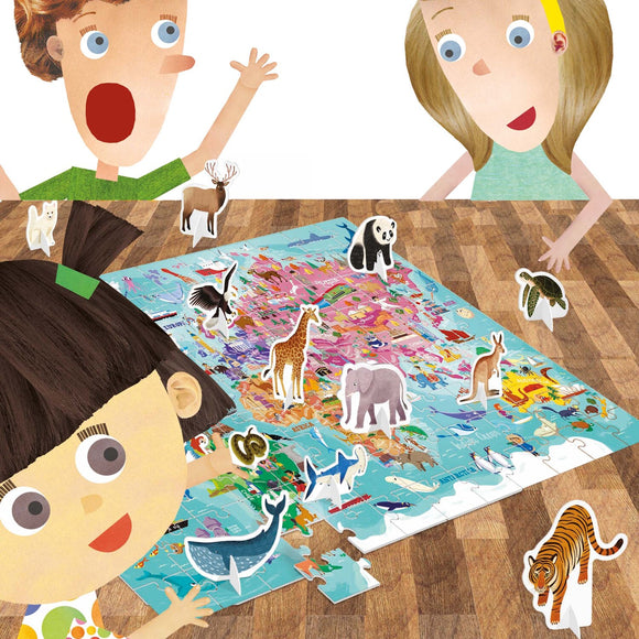 Children engaged in a jigsaw puzzle activity featuring the World Tour with 3D Animals by Headu. The puzzle showcases colorful illustrations of various animals and a world map, with 3D animal pieces being placed on the puzzle by excited kids.