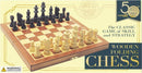 A 12-inch wooden folding chess set from House of Marbles. The chessboard features alternating light and dark squares with intricately designed black and natural wooden chess pieces arranged for play. The set is compact and perfect for both beginners and seasoned players, embodying the classic game of skill and strategy.