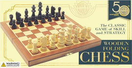 A 12-inch wooden folding chess set from House of Marbles. The chessboard features alternating light and dark squares with intricately designed black and natural wooden chess pieces arranged for play. The set is compact and perfect for both beginners and seasoned players, embodying the classic game of skill and strategy.