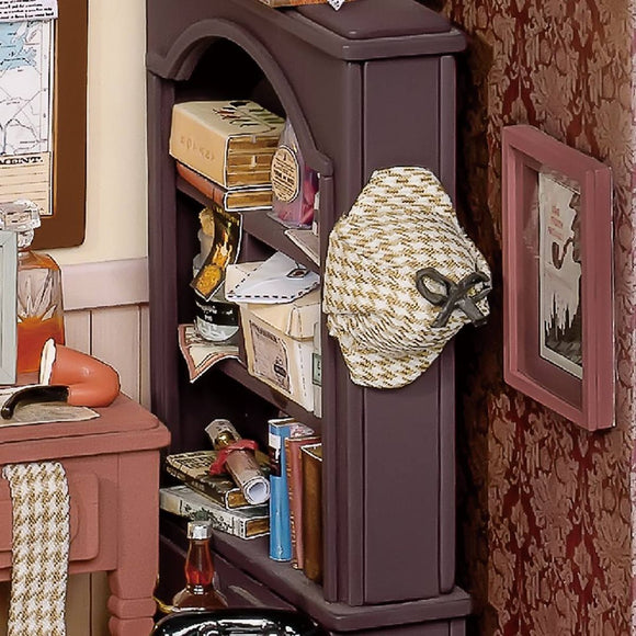 A detailed display of Mose's Detective Agency, showcasing an intricately designed bookshelf filled with various books, papers, and a detective hat. The background features a vintage map and decorated walls, creating a cozy atmosphere reminiscent of a classic detective's office.