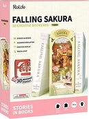 The Falling Sakura DIY Book Nook by Robotime is a beautifully designed 3D creative bookend kit featuring a serene cherry blossom scene. The kit includes wooden pieces to assemble a miniature environment with intricate details, a touch light, and a themed display, perfect for book lovers and DIY enthusiasts alike. Ideal for enhancing home decor with a touch of nature and creativity.
