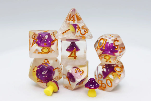 A vibrant Purple Mushroom RPG Dice Set featuring various polyhedral dice. Each die is semi-transparent with purple mushroom inclusions and golden numbers, perfect for tabletop gaming enthusiasts.