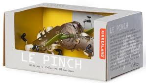 Le Pinch wind-up toy in packaging