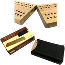 A compact travel cribbage set featuring a magnetic wooden board with peg holes, magnetic clasps, and a sleek black carrying case. The packaging displays 'Classic Game Collection Travel Cribbage' indicating it's suitable for ages 14 and up.