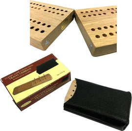 A compact travel cribbage set featuring a magnetic wooden board with peg holes, magnetic clasps, and a sleek black carrying case. The packaging displays 'Classic Game Collection Travel Cribbage' indicating it's suitable for ages 14 and up.