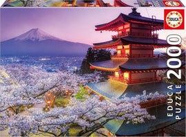 Educa jigsaw puzzle titled 'MOUNT FUJI; JAPAN'. The image features a stunning view of Mount Fuji with cherry blossoms in the foreground and a traditional Japanese pagoda, showcasing vibrant colors during sunset.