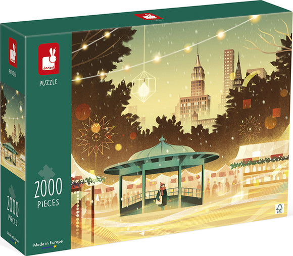 The New York Bustle jigsaw puzzle by Juratoys features a festive winter scene with a gazebo and iconic skyscrapers in the background. The puzzle box displays vibrant artwork depicting holiday lights and decorations. It contains 2000 pieces and is made in Europe, perfect for puzzle enthusiasts looking for a challenging and beautiful design.