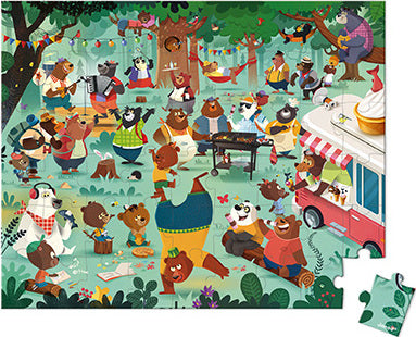 A colorful jigsaw puzzle featuring a lively scene with various cartoon bears engaged in activities in a park, including playing music, enjoying ice cream, and having a picnic. The puzzle showcases a vibrant outdoor setting filled with trees, flowers, and cheerful decorations, inviting family fun and creativity.