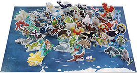 Myths & Legends 3D Puzzle by Juratoys featuring a colorful, intricate jigsaw puzzle depicting various mythical creatures from around the world, displayed in a vibrant landscape with raised pieces for a 3D effect.
