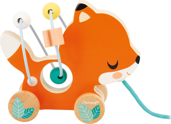 The Pure Animal Baby Looping Asst by Janod is a colorful wooden toy designed for young children. It features a charming fox design with vibrant orange colors and cheerful facial expression. The toy includes colorful beads threaded onto flexible wires, allowing for engaging play and fine motor skill development. The fox has smooth, rounded wheels, making it easy for little hands to pull along during playtime.