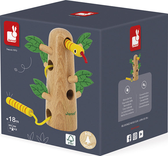 The Tropik Tropical Lace Up Tree by Janod features a wooden tree trunk with colorful snake and leaf designs. It includes holes for threading, promoting fine motor skills and hand-eye coordination. Suitable for children aged 18 months and above, this educational toy encourages interactive play.