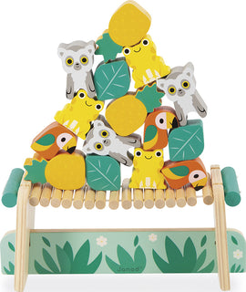 Tropik Balancing Games by Juratoys features colorful wooden pieces shaped like animals, fruits, and leaves, arranged in a playful stack on a wooden base, promoting balance and coordination.