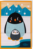 Colorful jigsaw puzzle featuring a cute illustration of a large penguin and a smaller penguin on an icy background with mountains and a fish in water.