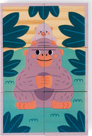 A colorful jigsaw puzzle featuring a friendly gorilla with a baby gorilla on its head, surrounded by green leaves. The puzzle has six wooden blocks that fit together to reveal the cheerful animals in a playful jungle setting.