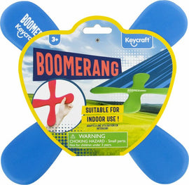 Keycraft Boomerang toy featuring a vibrant blue and green design, suitable for indoor use. The packaging displays a hand holding the boomerang, with a scenic background of fields and a warning for choking hazards. Designed for children aged 3 and up.