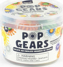 A clear plastic container labeled 'Pop Gears' featuring colorful interlocking gear pieces. The container showcases the vibrant colors of the gears, which can be assembled into various shapes. The label indicates that the product includes 21 pieces and is suitable for ages 3 and up. A warning about small parts is visible.