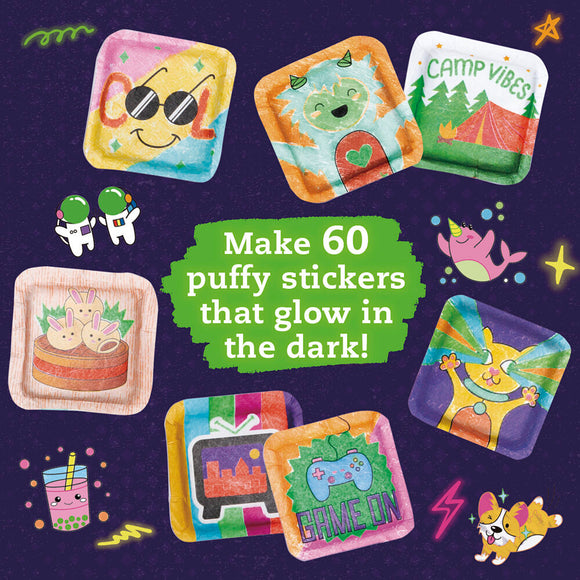 A colorful DIY kit by Klutz titled 'Make Your Own Glow-In-The-Dark' with 60 puffy sticker designs. The stickers include fun illustrations of a happy sun wearing sunglasses, playful animals, and vibrant patterns that glow in the dark, perfect for crafting and personalizing items.