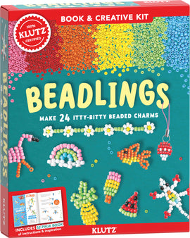 Beadlings Klutz Kit by Klutz, featuring colorful beads to create 24 tiny bead charms. The box showcases a variety of completed designs including flowers, animals, and food items, alongside a 52-page instructional book that provides inspiration and guidance for crafting. The vibrant backdrop highlights the fun and creativity this DIY kit offers for all ages.