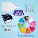 Beadlings Klutz Kit by Klutz featuring a variety of colorful beads organized in a circular case. Includes a white funnel, closure clips, metallic wire, and a gift box labeled 'To: From:'. Perfect for DIY jewelry-making projects.