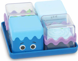 Cool Down Cubes Sensory Fidget by Learning Resources displayed on a blue tray. The set includes colorful cubes with varying textures and faces, designed for sensory play and fidgeting. Ideal for calming nervous energy, each cube features different tactile elements, making it perfect for kids and adults alike.