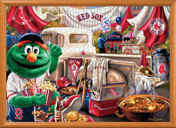 MasterPieces Boston Red Sox Gameday jigsaw puzzle featuring the Red Sox mascot, a bustling ballpark scene with fans, ice cream carts, and baseball gear, all surrounded by vibrant team colors.